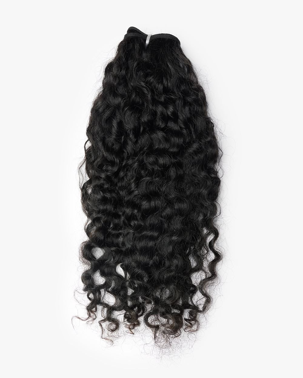 Raw Burmese curly hair bundle on white background