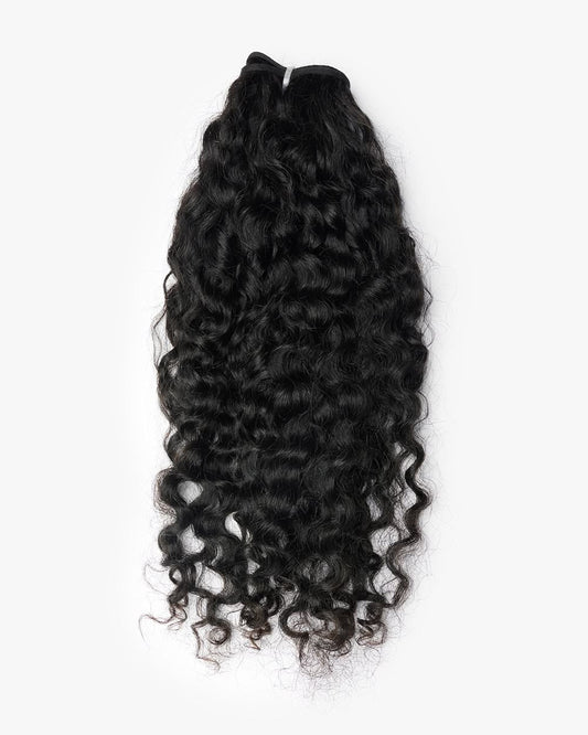 Raw Burmese curly hair bundle on white background