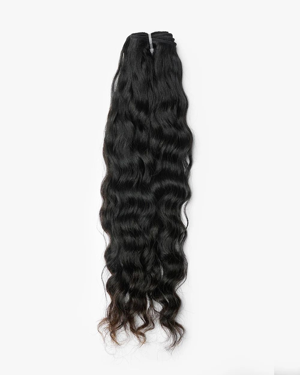 Raw Cambodian wavy hair bundle on white background